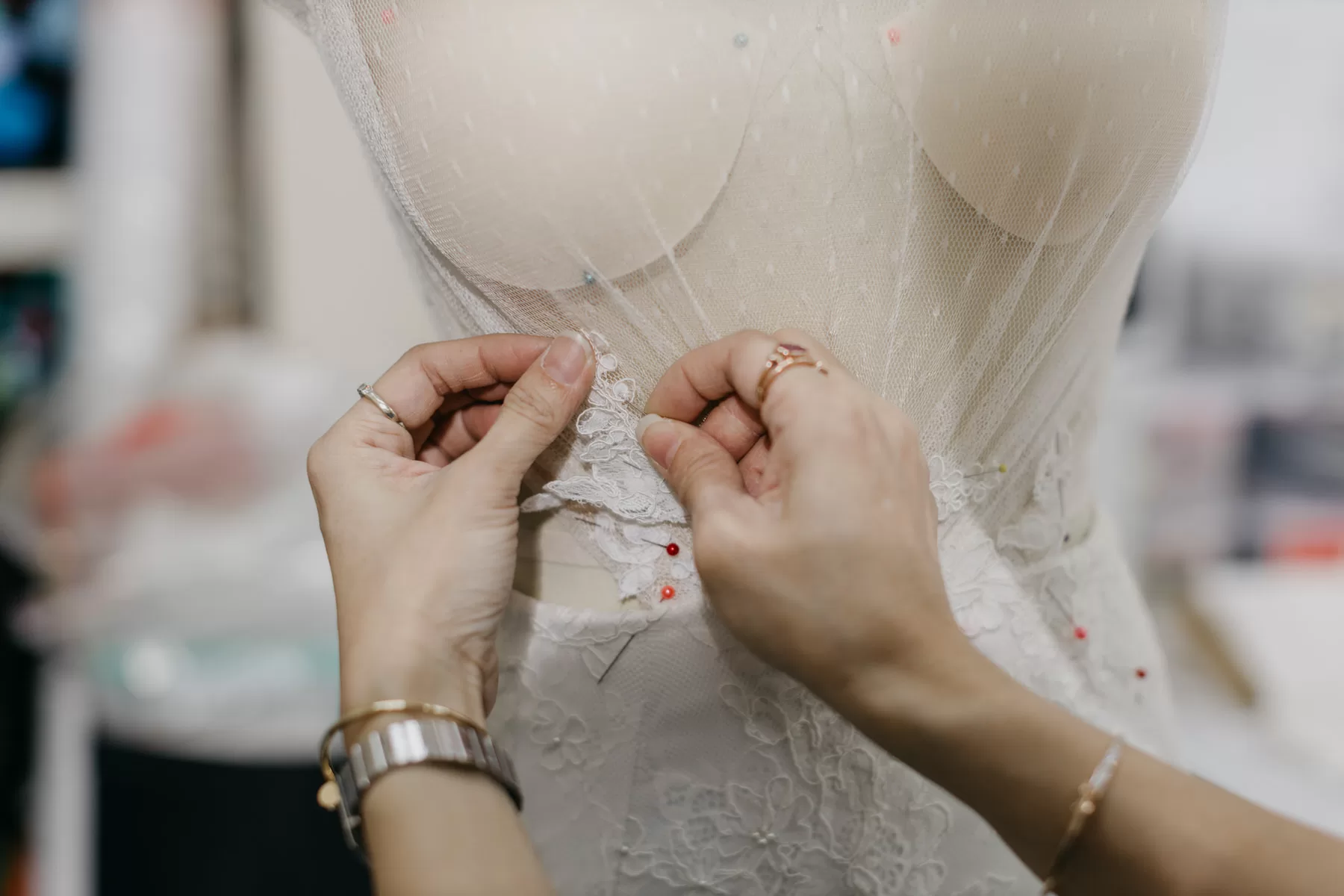 Close-up of delicate embroidery on a Celine Ooi bridal gown.