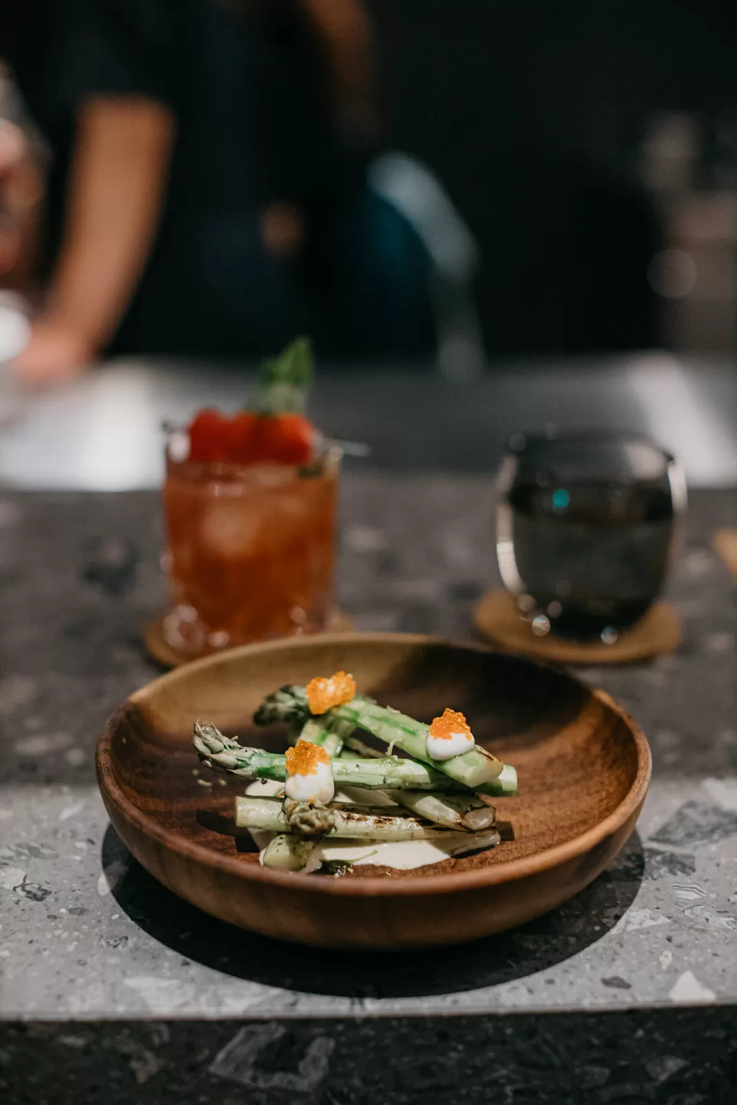 Chef Jun Wong showcasing his culinary expertise with a beautifully plated dish.